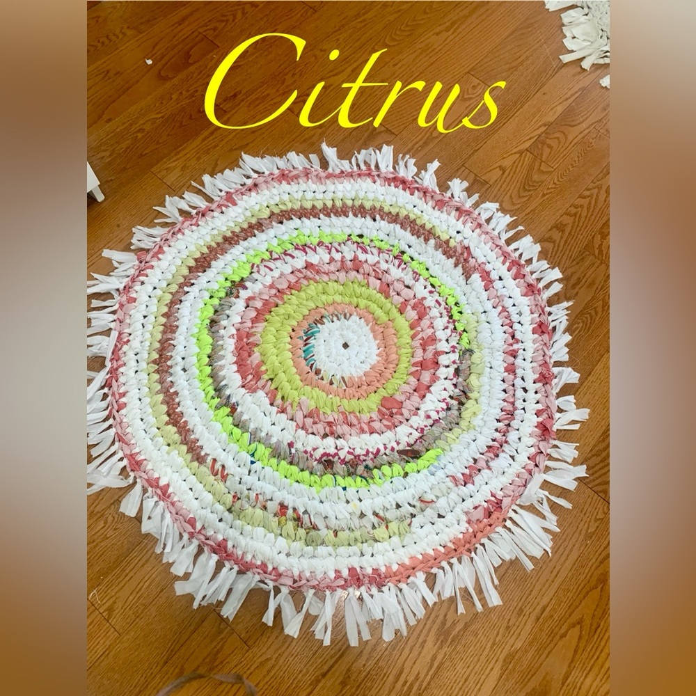Handmade up cycled fabric rug. One of a kind.
